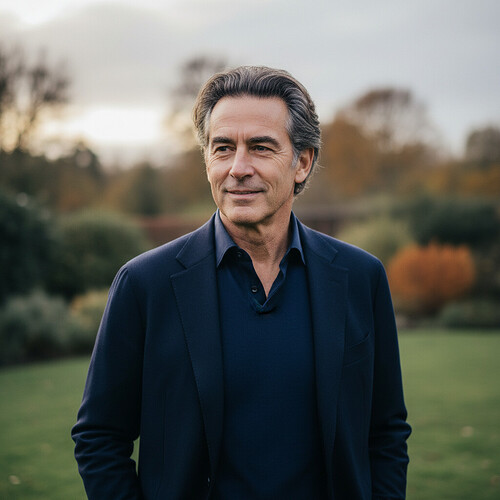 Man with a natural-looking, fuller hairline.