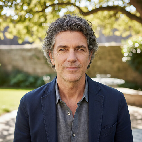 Mature man with natural-looking results after hair restoration.